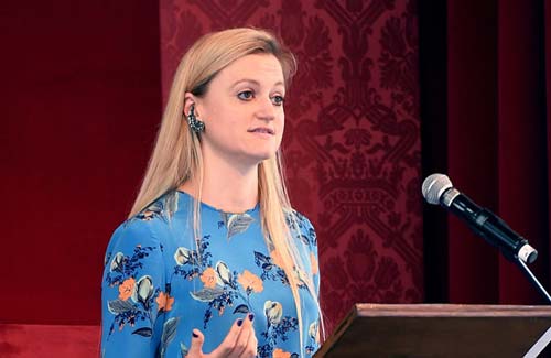 Sophie Hackford speaking on stage.