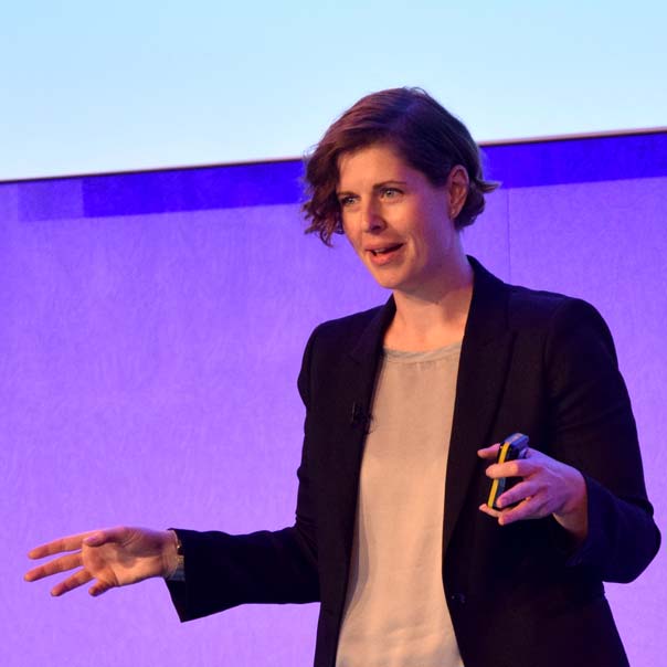 Lindsay Herbert speaking on stage.