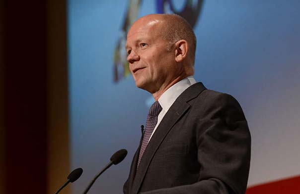 William Hague speaking on stage