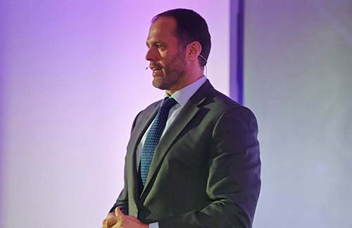 Martin Bayfield speaking on stage.