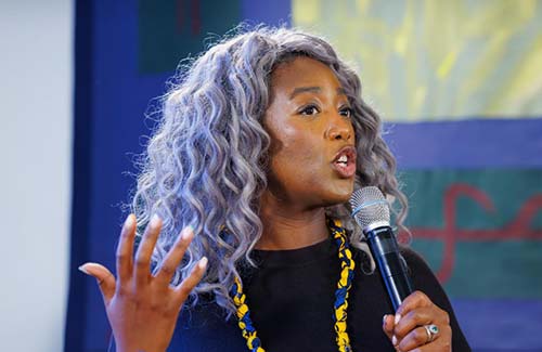 Anne-Marie Imafidon speaking on stage