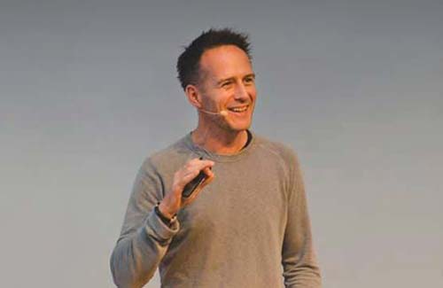 Ben Legg speaking on stage