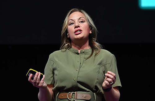 Sarah Armstrong-Smith speaking on stage.