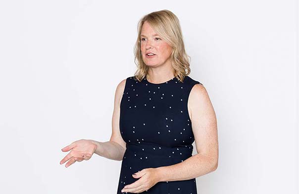 Vivienne Ming speaking on stage.