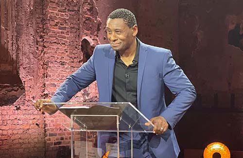 David Harewood speaking on stage.