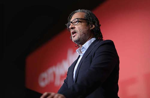 David Olusoga speaking on stage.