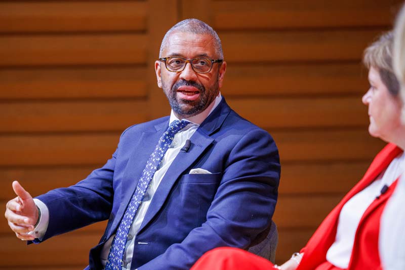 James Cleverly speaking on stage at the Festival of Speech