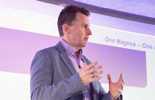 Nigel Owens speaking on stage.