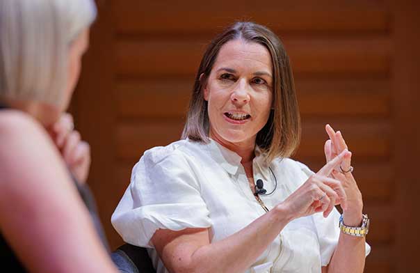 Claire Williams speaking on stage about leadership